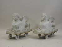 Lot 268 - A pair of carved marble sphinxes, after the...