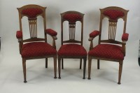 Lot 273 - A set of eight (6+2) Art Nouveau oak dining...