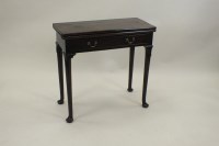 Lot 283 - A George II fold-over top tea table, mid 18th...