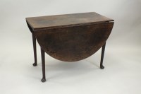 Lot 284 - A mahogany drop leaf dining table, 18th...