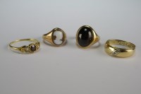 Lot 5 - A three stone garnet and seed pearl ring,...