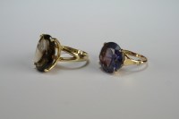 Lot 6 - A smoky quartz dress ring, stamped '14k',...