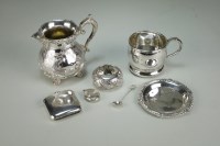 Lot 29 - A small silver cream jug, together with a...
