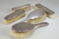 Lot 47 - A collection of six silver mounted brushes,...