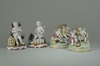 Lot 56 - A pair of Continental porcelain figural groups...
