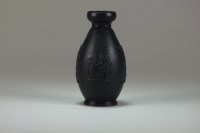 Lot 84 - A small Wedgwood black basalt vase, 19th...