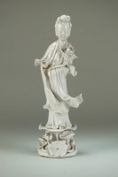 Lot 117 - A Chinese Dehua porcelain figure of Guanyin...