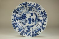 Lot 120 - A Chinese blue and white dish Kangxi...