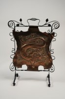 Lot 287 - A wrought iron and copper Art Nouveau fire...