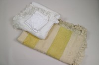 Lot 297 - Two Durham style quilts, an eiderdown, table...