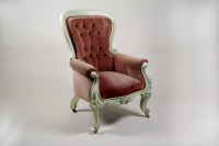 Lot 311 - A Victorian button back easy chair with later...