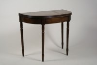 Lot 321 - A Regency mahogany fold over top tea table of...