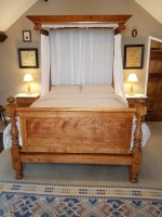 Lot 367 - A Victorian satin walnut half tester bed with...