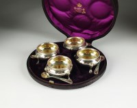 Lot 33 - A cased set of four Victorian silver cauldron...
