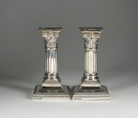 Lot 53 - A pair of silver mounted short candlesticks,...