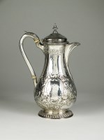 Lot 75 - A George III silver hot water jug, Philip...
