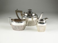 Lot 86 - An Edwardian three piece silver tea service,...