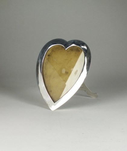 Lot 95 - A Victorian heart shaped silver mounted frame,...