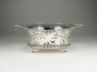 Lot 96 - An Edwardian Scottish silver pierced basket,...