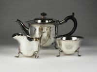 Lot 101 - An Edwardian three piece silver tea service,...