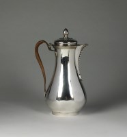 Lot 114 - A George III silver hot water jug, Andrew...