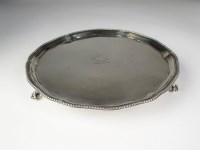 Lot 115 - A George III silver waiter, E*, London 1784,...