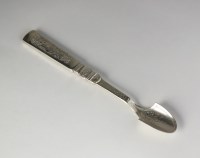 Lot 123 - An American silver cheese scoop, with...