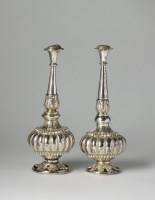 Lot 127 - A pair of white metal Indian rosewater...