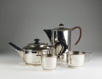 Lot 143 - An Art Deco four piece silver tea service,...