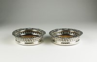 Lot 145 - A pair of George III silver mounted wine...