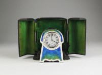 Lot 147 - An Art Nouveau silver enamelled clock, Henry...