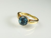 Lot 184 - A single stone blue topaz dress ring, the...