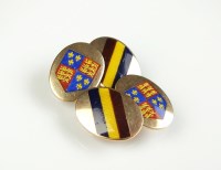 Lot 193 - A pair of enamelled cufflinks, the yellow...