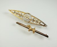 Lot 195 - A diamond and seed pearl bar brooch, of...