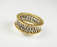 Lot 197 - A yellow and white metal stylised curb link...