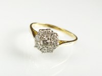 Lot 203 - A diamond floral cluster ring, designed as a...