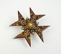 Lot 211 - A mid 19th century stylised Maltese cross...