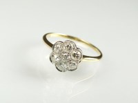 Lot 215 - A diamond floral cluster ring, designed as a...