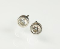 Lot 220 - A pair of 18ct white gold diamond stud...