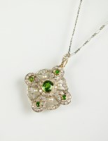 Lot 240 - A demantoid garnet, diamond and seed pearl...