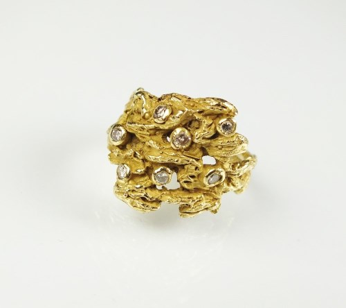 Lot 243 - An 18ct yellow gold diamond ring by Andrew...