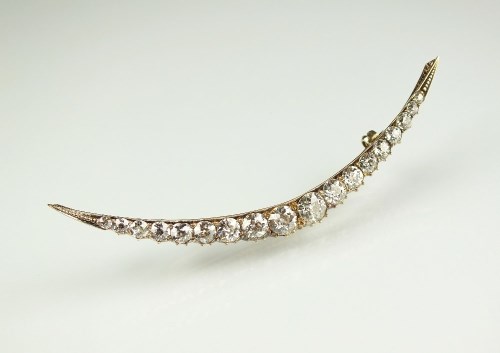 Lot 249 - A late 19th century diamond crescent brooch,...