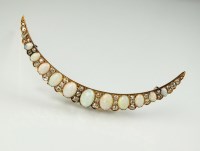 Lot 250 - A late 19th century diamond and opal crescent...