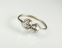 Lot 258 - A two stone diamond crossover ring, the two...