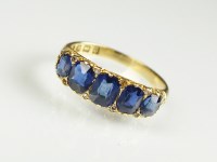 Lot 259 - An 18ct gold Victorian five stone sapphire...