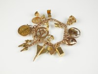 Lot 260 - A 9ct rose gold curb link bracelet, with...