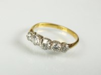Lot 262 - A graduated five stone diamond ring, the five...