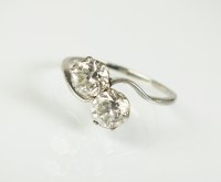 Lot 263 - A two stone diamond crossover ring, the two...