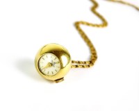 Lot 265 - A Lady's Bucherer circular pendant watch, the...