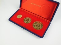 Lot 539 - A cased 18ct gold three medallion Battle of...